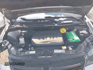 2016 Dodge Grand Caravan SE with VIN 2C4RDGBG7GR252195, listed as a IAAI auction lot 41415977 with 199,453 mi miles and . Bid and sale history available at DreamBid. Image 10.