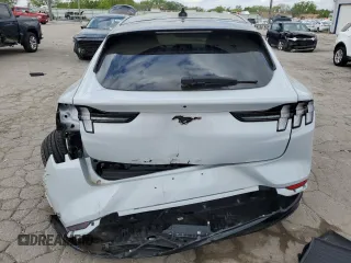 2023 Ford Mustang Mach-E Premium z VIN 3FMTK3S59PMB03597, wystawiony jako Copart lot #56572285 z przebiegiem 4511 mil mil oraz Tytuł czysty. Historia ofert i sprzedaży dostępna na DreamBid. Obrazek 6.