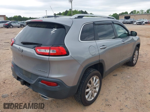 2015 Jeep Cherokee Limited with VIN 1C4PJMDS3FW706058, listed as a IAAI auction lot 41951302 with 163,404 mi miles. Bid and sale history available at carsss.com. Image 4.