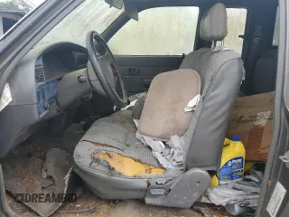 1989 Toyota Pickup DLX z VIN JT4RN93P5K0008068, wystawiony jako Copart lot #58843695 z przebiegiem 285 895 mil mil oraz Tytuł czysty. Historia ofert i sprzedaży dostępna na DreamBid. Obrazek 7.