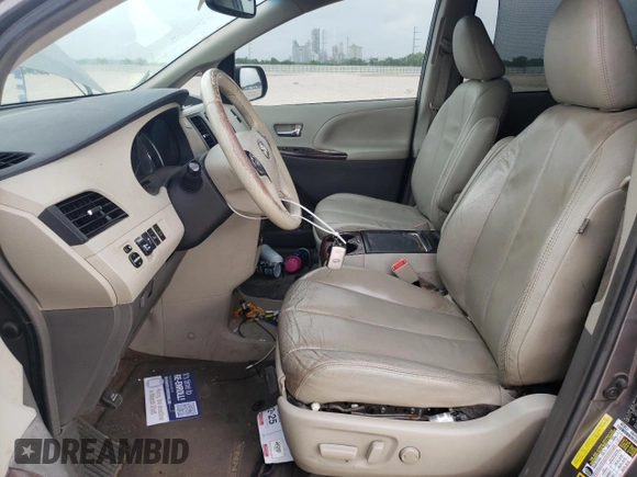 2014 Toyota Sienna XLE with VIN 5TDYK3DC2ES510647, listed as a Copart auction lot 54488845 with 216,091 mi miles and Salvage Title. Bid and sale history available at DreamBid. Image 7.