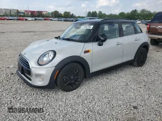 2018 MINI Hardtop 4 Door Cooper with VIN WMWXU1C52J2F81037, listed as a Copart auction lot 57306785 with 57,630 mi miles and Salvage title. Bid and sale history available at DreamBid. Image 1.