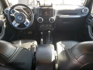 2016 Jeep Wrangler Unlimited Rubicon with VIN 1C4HJWFG3GL155092, listed as a Copart auction lot 62410365 with 82,231 mi miles and Salvage title. Bid and sale history available at DreamBid. Image 8.