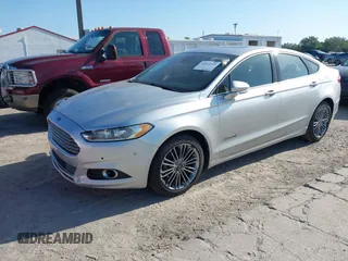 2013 Ford Fusion SE Hybrid with VIN 3FA6P0LU6DR127108, listed as a IAAI auction lot 42023529 with 250,057 mi miles. Bid and sale history available at carsss.com. Image 2.