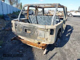 2014 Jeep Wrangler Unlimited Rubicon with VIN 1C4BJWFG9EL197804, listed as a IAAI auction lot 41751310 with 1 mi miles. Bid and sale history available at carsss.com. Image 4.
