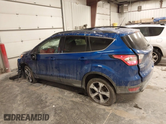 2017 Ford Escape SE z VIN 1FMCU9GD2HUB99955, wystawiony jako IAAI lot #41572200 z przebiegiem 63 023 mil mil oraz . Historia ofert i sprzedaży dostępna na DreamBid. Obrazek 14.