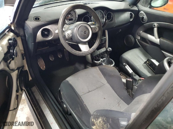 2006 MINI Cooper Convertible S with VIN WMWRH33506TF88840, listed as a Copart auction lot 82576634 with 145,821 mi miles and Non Repairable. Bid and sale history available at carsss.com. Image 8.