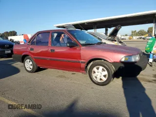 1989 Toyota Corolla with VIN JT2AE92E4K0112945, listed as a Copart auction lot 83382604 with 209,462 mi miles and Salvage title. Bid and sale history available at DreamBid. Image 4.