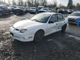 2002 Pontiac Sunfire SE z VIN 1G2JB524527344014, wystawiony jako Copart lot #87059504 z przebiegiem 123 760 mil mil oraz Szkoda całkowita • Salvage title. Historia ofert i sprzedaży dostępna na DreamBid. Obrazek 1.