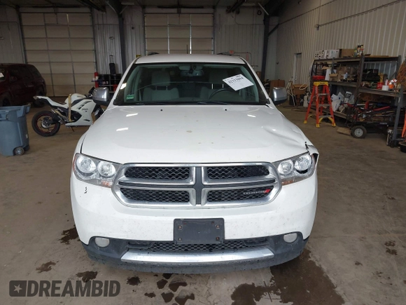 2012 Dodge Durango SXT with VIN 1C4RDJAGXCC295138, listed as a IAAI auction lot 42333094 with 96,581 mi miles and . Bid and sale history available at DreamBid. Image 12.