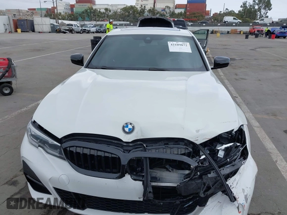 2021 BMW 3 Series 330i z VIN 3MW5R1J04M8C06043, wystawiony jako IAAI lot #42109872 z przebiegiem 62 325 mil mil oraz . Historia ofert i sprzedaży dostępna na DreamBid. Obrazek 12.