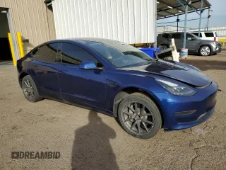 2023 Tesla Model 3 with VIN 5YJ3E1EA5PF449028, listed as a Copart auction lot 88924805 with 55,350 mi miles and Clean Title. Bid and sale history available at DreamBid. Image 4.