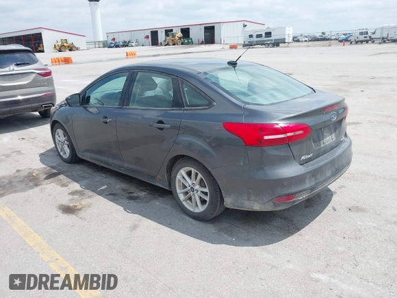 2016 Ford Focus SE z VIN 1FADP3F2XGL298174, wystawiony jako IAAI lot #42468032 z przebiegiem 236 803 mil mil oraz . Historia ofert i sprzedaży dostępna na DreamBid. Obrazek 3.