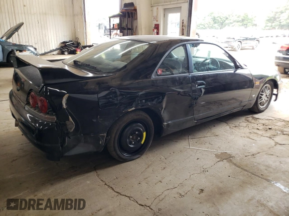 1997 Nissan Skyline z VIN HR33101590, wystawiony jako Copart lot #68650354 z przebiegiem 76 082 mil mil oraz Szkoda całkowita • Salvage title. Historia ofert i sprzedaży dostępna na DreamBid. Obrazek 3.
