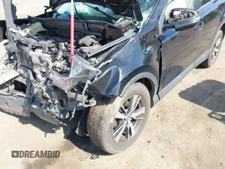 2018 Toyota RAV4 XLE with VIN 2T3WFREVXJW484872, listed as a IAAI auction lot 42144810 with Not provided miles and . Bid and sale history available at DreamBid. Image 6.