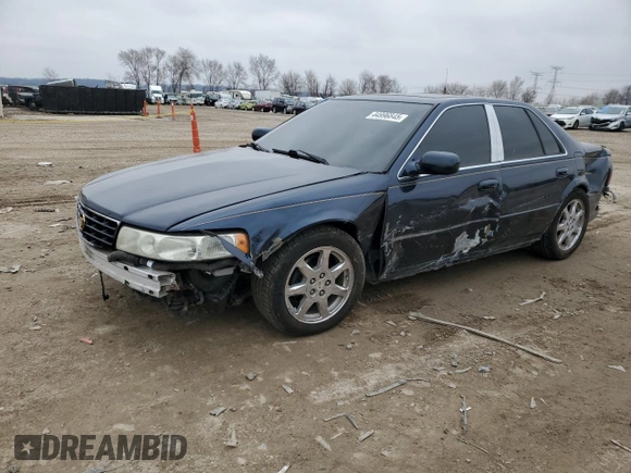 2002 Cadillac Seville Touring STS z VIN 1G6KY54932U174599, wystawiony jako Copart lot #44996845 z przebiegiem 168 819 mil mil oraz Szkoda całkowita • Salvage title. Historia ofert i sprzedaży dostępna na DreamBid. Obrazek 1.