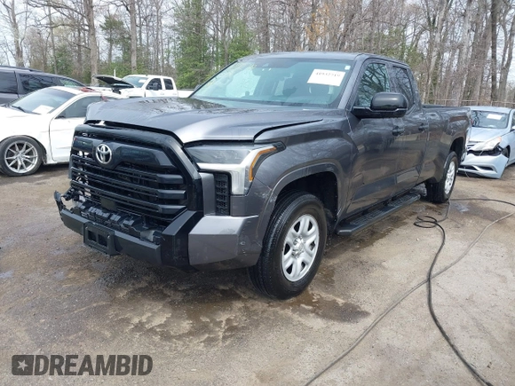 2023 Toyota Tundra with VIN 5TFKB5GDXPX002218, listed as a IAAI auction lot 41932719 with 71,335 mi miles and . Bid and sale history available at DreamBid. Image 2.