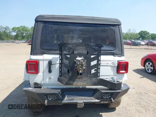 2018 Jeep Wrangler Unlimited Sport S with VIN 1C4HJXDGXJW146873, listed as a IAAI auction lot 42404813 with 73,929 mi miles and . Bid and sale history available at DreamBid. Image 17.