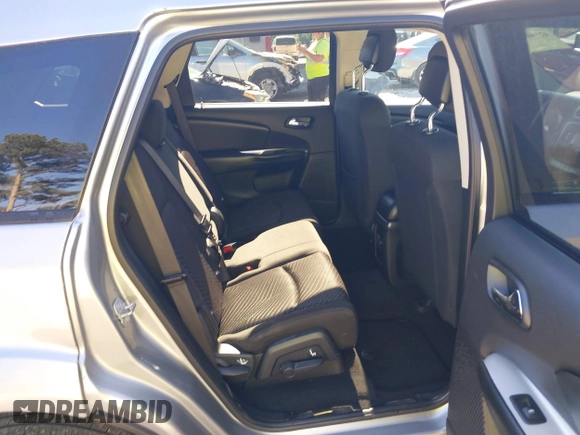 2017 Dodge Journey SXT z VIN 3C4PDCBG4HT563310, wystawiony jako IAAI lot #42190636 z przebiegiem 171 054 mil mil oraz . Historia ofert i sprzedaży dostępna na DreamBid. Obrazek 8.