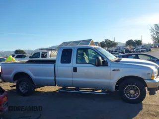2004 Ford Super Duty F-250 XL with VIN 1FTNX20S04EB40010, listed as a IAAI auction lot 41376342 with 276,771 mi miles. Bid and sale history available at carsss.com. Image 12.