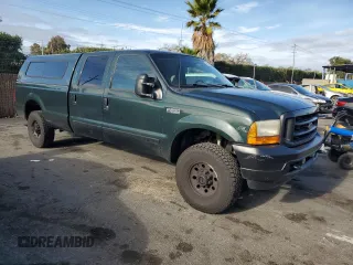 2001 Ford Super Duty F-250 XL with VIN 1FTNW21S21EB56495, listed as a Copart auction lot 85972944 with 142,122 mi miles and Salvage Title. Bid and sale history available at carsss.com. Image 4.