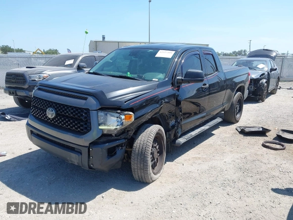 2019 Toyota Tundra SR with VIN 5TFUY5F13KX852912, listed as a IAAI auction lot 42327399 with 124,193 mi miles and . Bid and sale history available at DreamBid. Image 17.
