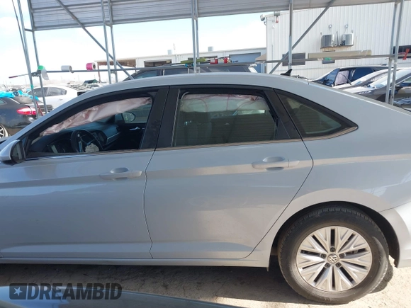 2019 Volkswagen Jetta S z VIN 3VWCB7BU3KM140279, wystawiony jako IAAI lot #41485306 z przebiegiem 68 105 mil mil oraz . Historia ofert i sprzedaży dostępna na DreamBid. Obrazek 14.