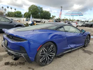 2023 McLaren GT z VIN SBM22GCA9PW003039, wystawiony jako Copart lot #47143765 z przebiegiem 2775 mil mil oraz Szkody całkowita. Historia ofert i sprzedaży dostępna na DreamBid. Obrazek 3.