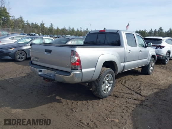 2015 Toyota Tacoma with VIN 3TMMU4FN7FM075543, listed as a IAAI auction lot 41761520 with 107,230 mi miles and . Bid and sale history available at DreamBid. Image 4.