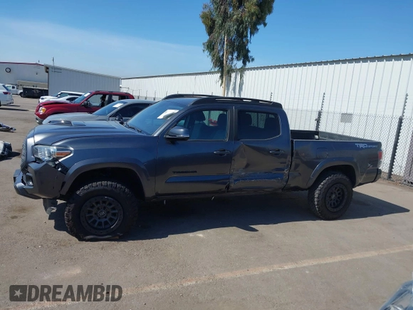 2020 Toyota Tacoma SR5 with VIN 3TMBZ5DN9LM025501, listed as a IAAI auction lot 42680028 with 109,404 mi miles and . Bid and sale history available at DreamBid. Image 14.