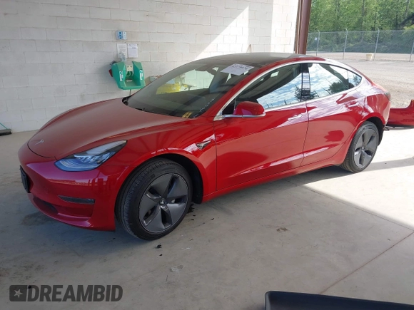2020 Tesla Model 3 Standard Range Plus z VIN 5YJ3E1EA7LF611669, wystawiony jako IAAI lot #42179974 z przebiegiem 17 696 mil mil oraz . Historia ofert i sprzedaży dostępna na DreamBid. Obrazek 2.