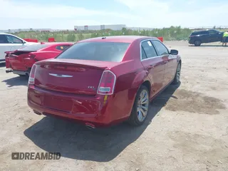 2014 Chrysler 300 with VIN 2C3CCABT2EH157487, listed as a IAAI auction lot 40127984 with 82,957 mi miles. Bid and sale history available at carsss.com. Image 4.