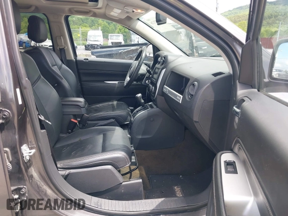 2017 Jeep Compass Latitude with VIN 1C4NJDEB0HD188771, listed as a IAAI auction lot 42377126 with 89,056 mi miles and . Bid and sale history available at DreamBid. Image 5.
