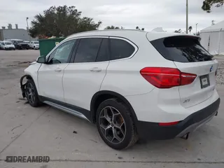2018 BMW X1 xDrive28i with VIN WBXHT3C37J3H33461, listed as a IAAI auction lot 40997589 with 1 mi miles. Bid and sale history available at carsss.com. Image 3.