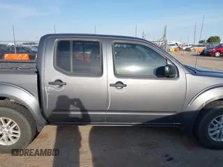 2021 Nissan Frontier SV with VIN 1N6ED0EB2MN702654, listed as a IAAI auction lot 42227414 with 142,309 mi miles and . Bid and sale history available at DreamBid. Image 14.
