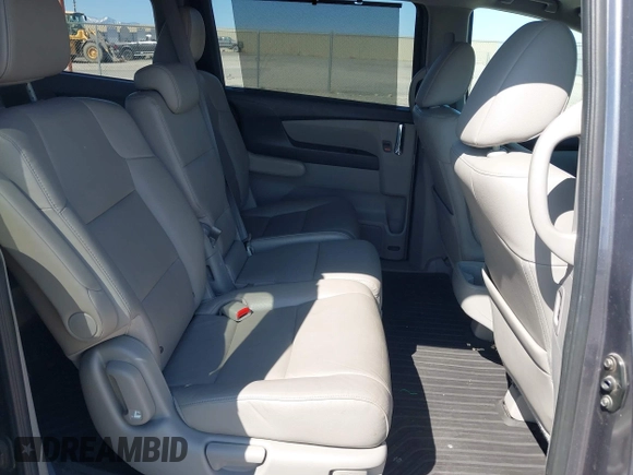 2014 Honda Odyssey EX-L with VIN 5FNRL5H67EB096027, listed as a IAAI auction lot 41950398 with 147,158 mi miles and . Bid and sale history available at DreamBid. Image 8.