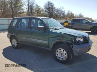 2000 Honda CR-V LX with VIN JHLRD1848YC013326, listed as a Copart auction lot 52247215 with 157,091 mi miles and Salvage Title. Bid and sale history available at carsss.com. Image 4.