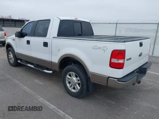 2004 Ford F-150 XLT with VIN 1FTPW14544KC72635, listed as a IAAI auction lot 42016190 with 212,694 mi miles. Bid and sale history available at carsss.com. Image 3.