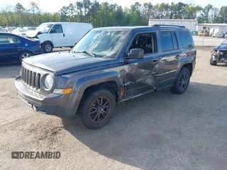 2016 Jeep Patriot Sport with VIN 1C4NJPBA9GD675253, listed as a IAAI auction lot 42058124 with 152,028 mi miles. Bid and sale history available at carsss.com. Image 2.
