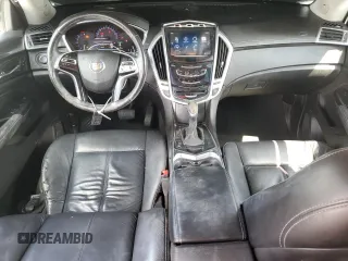 2014 Cadillac SRX with VIN 3GYFNAE38ES572951, listed as a Copart auction lot 53033685 with 104,204 mi miles and Salvage Title. Bid and sale history available at DreamBid. Image 8.