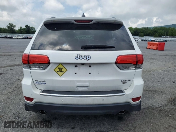 2014 Jeep Grand Cherokee Limited with VIN 1C4RJFBG2EC569780, listed as a Copart auction lot 61708755 with 69,058 mi miles and Salvage title. Bid and sale history available at DreamBid. Image 6.