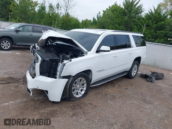 2019 GMC Yukon XL SLT with VIN 1GKS2GKC2KR369285, listed as a IAAI auction lot 40279008 with Not Provided miles and . Bid and sale history available at DreamBid. Image 2.