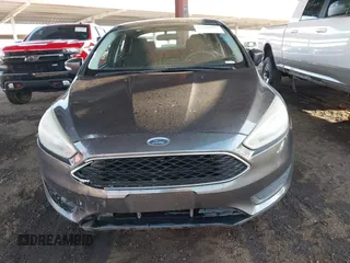 2016 Ford Focus SE with VIN 1FADP3F28GL330815, listed as a IAAI auction lot 41696821 with 125,247 mi miles. Bid and sale history available at carsss.com. Image 12.