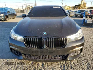 2017 BMW 7 Series 740i with VIN WBA7E2C38HG741255, listed as a Copart auction lot 39926213 with 76,321 mi miles. Bid and sale history available at carsss.com. Image 5.