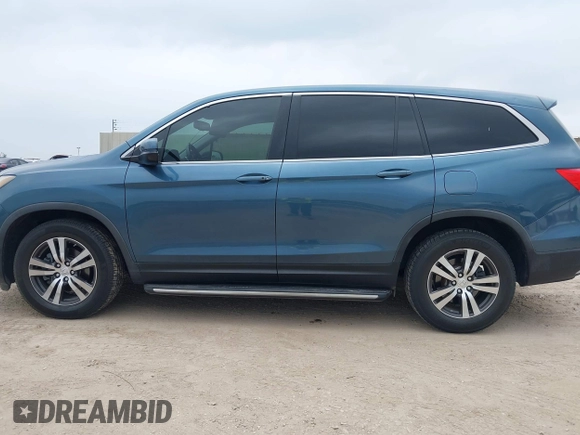 2017 Honda Pilot EX-L with VIN 5FNYF5H88HB042003, listed as a IAAI auction lot 42296542 with 172,823 mi miles and . Bid and sale history available at DreamBid. Image 14.