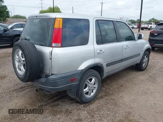 1998 Honda CR-V EX with VIN JHLRD1866WC039728, listed as a IAAI auction lot 42102198 with 192,998 mi miles. Bid and sale history available at carsss.com. Image 4.