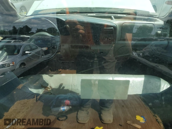 2007 Ford F-250 XL with VIN 1FTNF21577EA03016, listed as a Copart auction lot 65727204 with 132,073 mi miles and Salvage Title. Bid and sale history available at DreamBid. Image 8.
