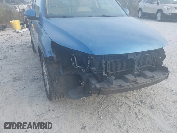 2017 Volkswagen Tiguan Wolfsburg Edition with VIN WVGRV7AX6HW504313, listed as a IAAI auction lot 40950812 with 149,884 mi miles and . Bid and sale history available at DreamBid. Image 6.