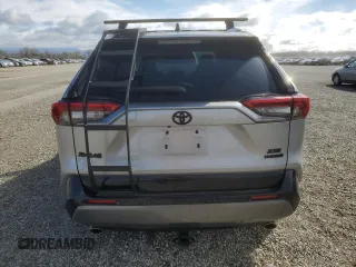 2021 Toyota RAV4 Hybrid XSE with VIN 4T3E6RFV1MU057403, listed as a Copart auction lot 47809415 with 56,570 mi miles and Salvage Title. Bid and sale history available at carsss.com. Image 6.