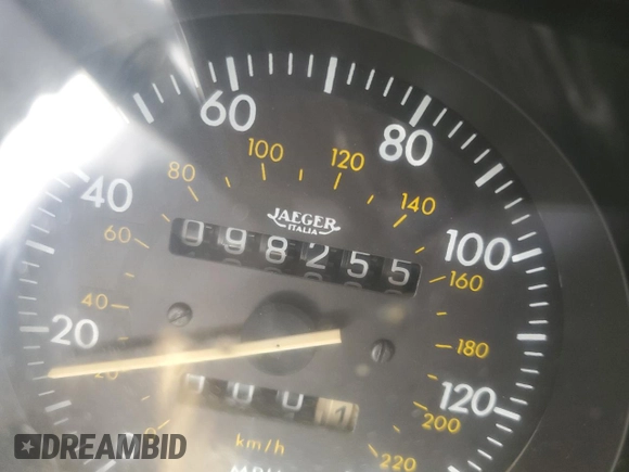 1989 Alfa Romeo Spider z VIN ZARBA5587K1066209, wystawiony jako Copart lot #77166704 z przebiegiem 98 255 mil mil oraz Szkoda całkowita • Salvage title. Historia ofert i sprzedaży dostępna na DreamBid. Obrazek 8.